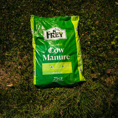 Bag of Frey Cow Manure on grass