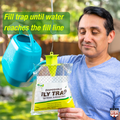 Rescue outdoor disposable fly trap with water-activated lure for effective fly control, shown with trap and lure components.