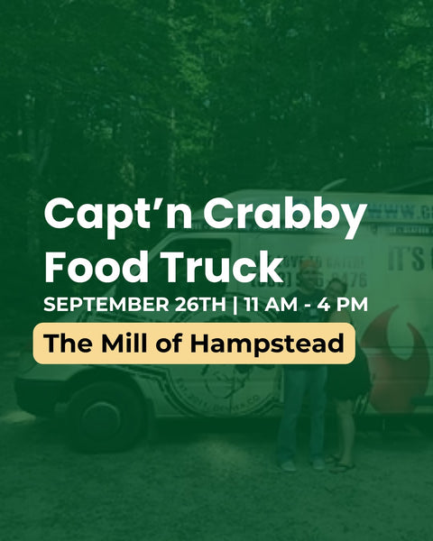 Promotional graphic for the Capt'n Crabby Food Truck, featuring a green-tinted outdoor photo of a food truck with two people standing in front. Large white text reads 'Capt'n Crabby Food Truck' with event details 'SEPTEMBER 26TH | 11 AM - 4 PM' and 'The Mill of Hampstead' in a yellow box.