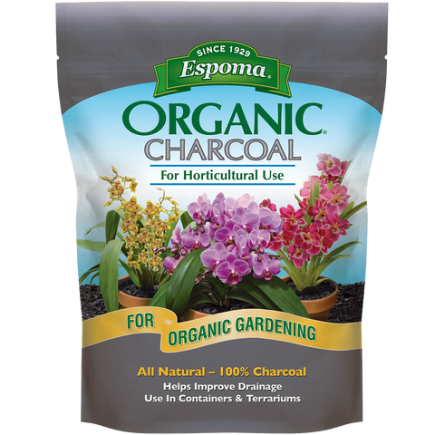 Espoma Organic Charcoal in a 4 qt. bag, suitable for lawn and garden use, shown in a clear image of the charcoal.