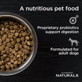 Diamond Naturals Adult Beef Meal & Rice Formula dry dog food with beef kibble and rice in a natural setting.