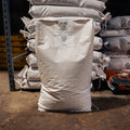 A white bag of The Mill Deer Crunch in a warehouse