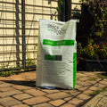 Nutrena Stock & Stable 12% textured horse feed in a large bag, showing the colorful, grain-based horse feed product.
