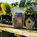 Wild bird seed blend by The Mill, featuring natural mixed seeds for attracting and feeding wild birds.
