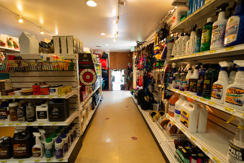 store aisle with shelves stocked with various products