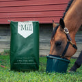 Bag of The Mill 11% Sweet Horse Feed showing the product packaging with the brand logo and product label.
