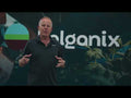 Bryan Hansel of Holganix giving a presentation on video with the Holganix logo in the background