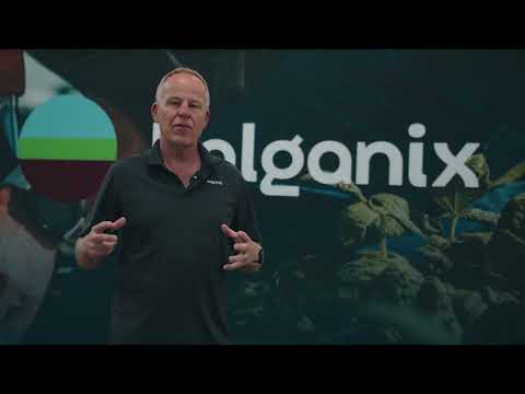 Bryan Hansel of Holganix giving a presentation on video with the Holganix logo in the background