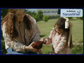 An informational video on 
Nutrena NatureWise Hearty Hen® Feed with a little girl petting a chicken. This link leads to YouTube.com.