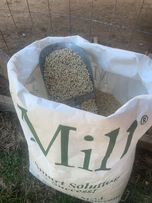 An open bag of Mill Layer feed to show the size of the pellets
