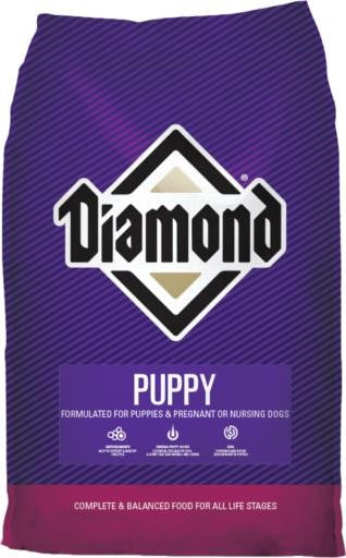 Diamond Puppy Dry Dog Food in a bag, showing the kibble and packaging for young dogs by Diamond brand.